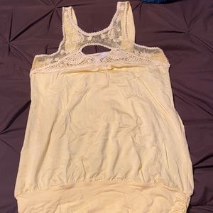 Yellow sleeveless top